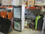 a refrigerator and a refrigerator freezer in a store