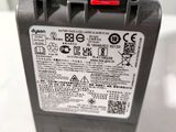 a close up of the back of a car ' s battery