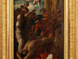 un tableau représentant un tableau d'un homme sur une croix, entouré d'autres personnes