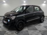 a picture of a small black car parked on a checkered floor