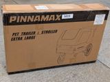 packaging for a new pet trailer and stroller on the sidewalk