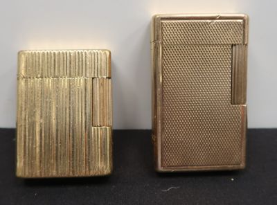two lighters sitting next to each other on a table