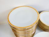 a lot of plates that are stacked on top of each other