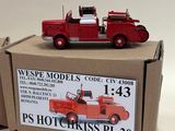 a box with a model of a firetruck on top of it