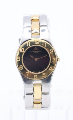 an image of a close up of a wrist watch on a white surface