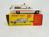 toy car in box on white surface with red and white stripes