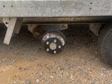 a flat tire on a flatbed truck with a flat tire