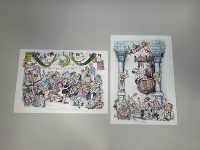 deux cartes de Noël posées sur une table, avec un dessin du Père Noël