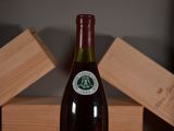 a bottle of wine that is sitting on a table