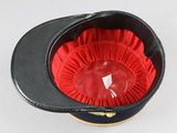 a black hat with a red flower inside of it