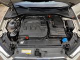 the engine of a car with its hood open and the hood open