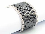 an image of a close up of a bracelet on a napkin