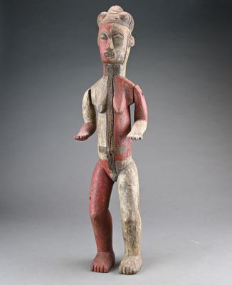 a wooden statue of a man with a long neck and a beard