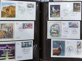 a lot of stamps on the back of a folder