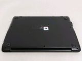 a laptop that is sitting on a white surface