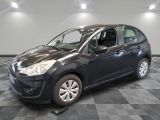 a picture of a black car parked in a garage