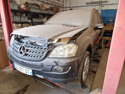 a picture of a car that has been damaged in a garage