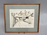 framed watercolor painting of a street scene with buildings in the background