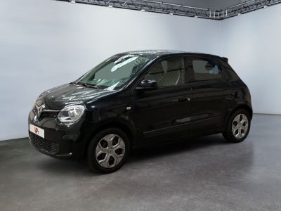 a picture of a small black car in a room