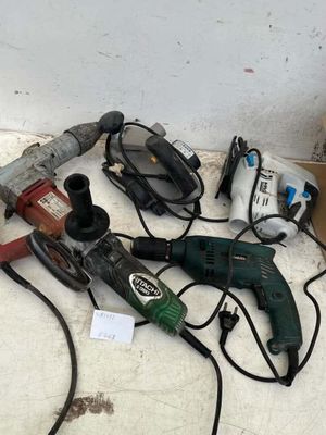 a lot of tools that are laying out on the floor