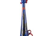 un vase bleu muni d'une anse rouge et contenant une paire de ciseaux