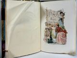 an open book with a picture of a woman in a dress