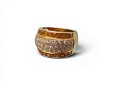 an image of a gold ring with diamonds on a white background