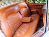 a brown leather seat in the back of a car