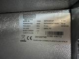 a label on the back of a refrigerator that says refrigerate
