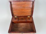a small wooden box with a drawer inside of it