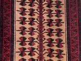 a rug with a red and black design on it