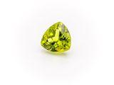 a trillion shaped peridot cut yellow sapphire stone