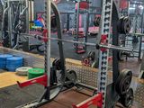 an image of a gym with a lot of equipment in it