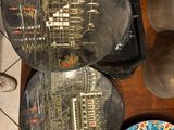 three plates that are sitting on a table