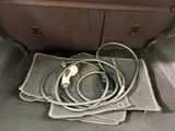 a bunch of wires that are in the trunk of a car