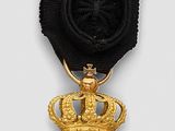 an image of a medal with a star on top of it