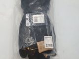 a pair of gloves in a plastic bag on a table