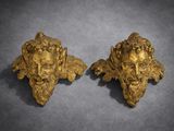 paire de têtes en bronze doré représentant un homme et une femme