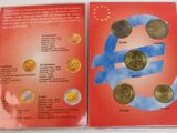 the back cover of a book with a picture of a euro coin
