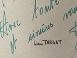 a close up of a piece of paper with writing on it