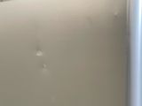 a close up of a white and blue counter top in a kitchen
