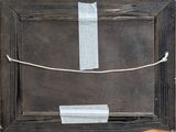 a picture of a piece of wood with a piece of paper taped to it