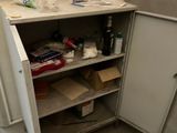 a small cabinet in the corner of the room