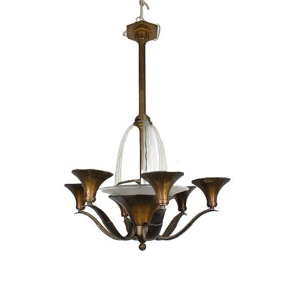 a close up of a chandelier with three lights on it