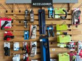 a wall of assorted items on display in a store
