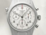 a silver watch with a white face and a red second hand