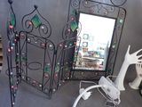 a picture of a mirror and a mirror with lights on it