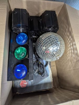 a box with a disco ball and a disco ball inside of it