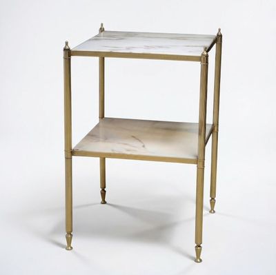 an image of a marble topped side table on a white background