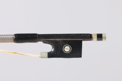 an image of a close up of a violin bow on a white background
